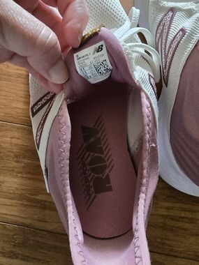 New Balance Women’s Pink and White Running Sneakers